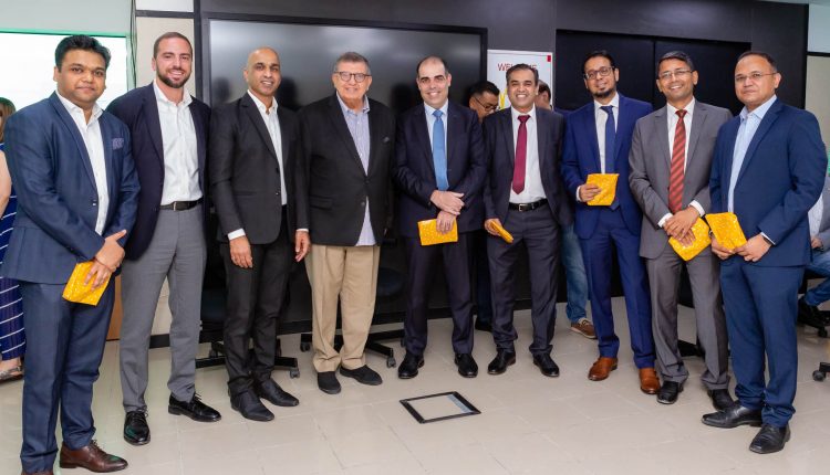 Rafic Fakih, Managing Director, McDonald’s UAE (center left) with Marwan Zeineddine, Executive Director, Strategic Industries, SAP UAE (center right), and Prakash Rao, Information System Director, Head of SAP Practice, McDonald’s UAE (second from left).