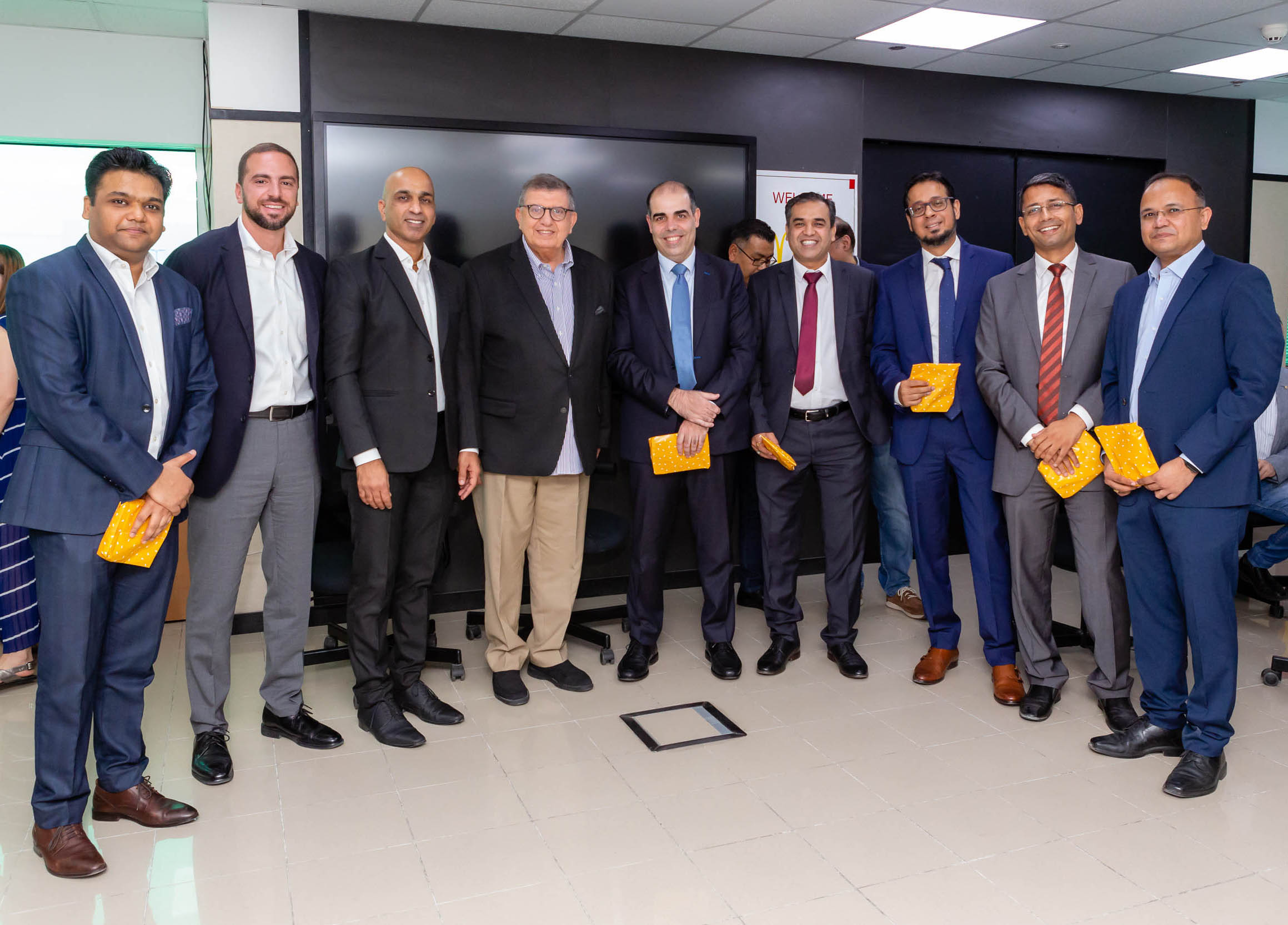 Rafic Fakih, Managing Director, McDonald’s UAE (center left) with Marwan Zeineddine, Executive Director, Strategic Industries, SAP UAE (center right), and Prakash Rao, Information System Director, Head of SAP Practice, McDonald’s UAE (second from left).