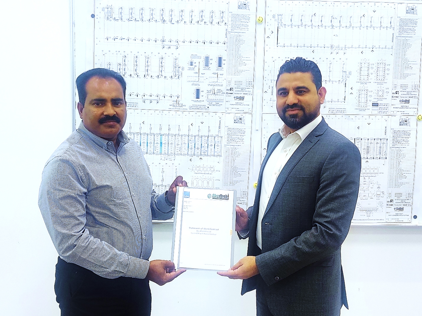 (L-R) Joji Sebastian, Abu Dhabi Precast LLC and Murtaza Ezzi, Index Infotech