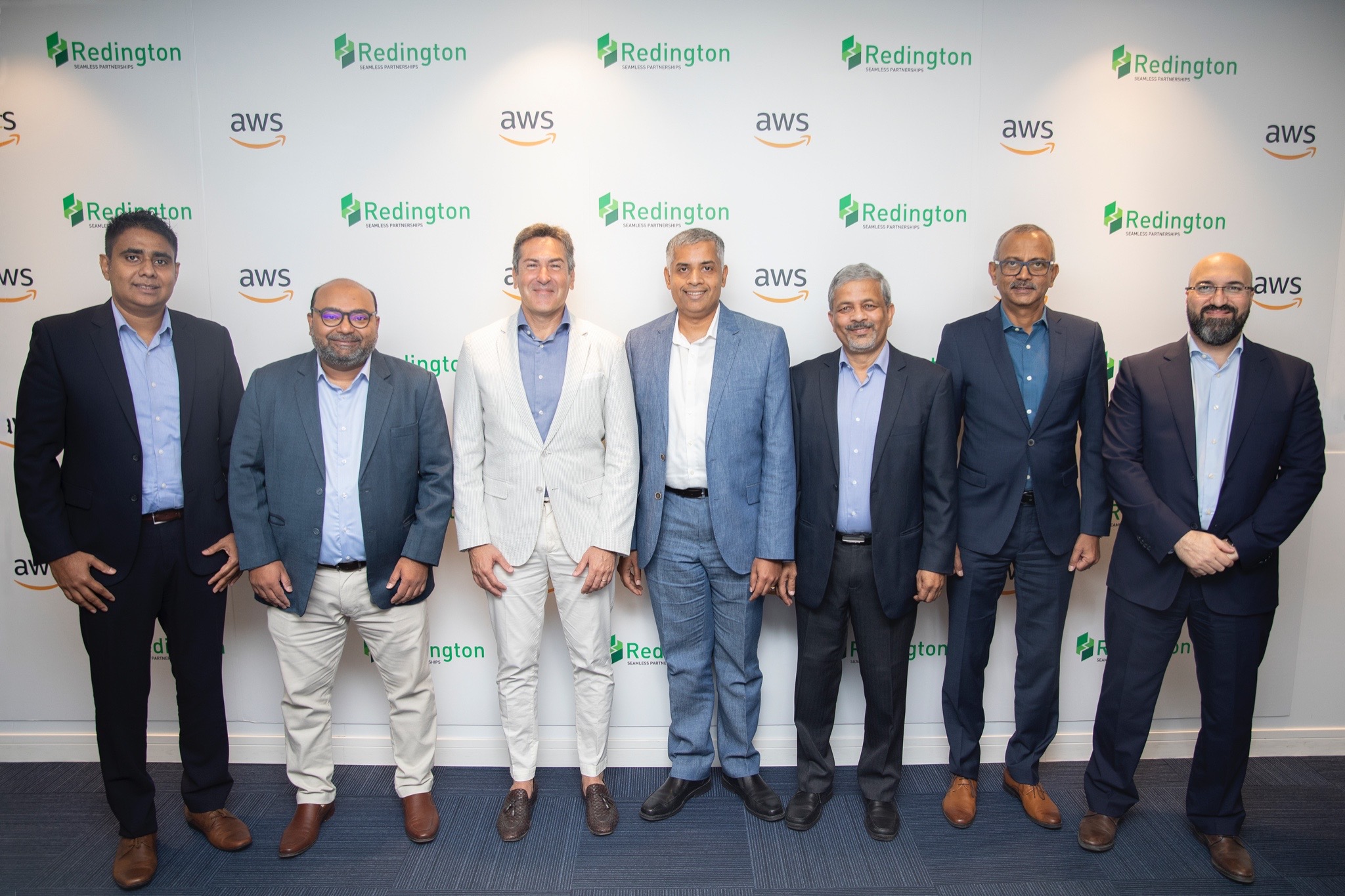 (L-R) Dharshana K, SVP at Redington Value, Sayantan Dev, President at Redington Value, Vittorio Sanvito, EMEA Director of Partner Development at AWS, Ramkumar B, General Manager - Channel & Alliances at AWS, Rajiv Srivastava, Managing Director at Redington Group, Viswanath Pallasena, CEO, Redington Gulf and Mohammed Laimon, Partner Development Manager at AWS